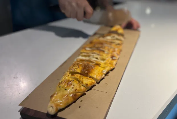 Closed pide with kavurma and kaşar cheese