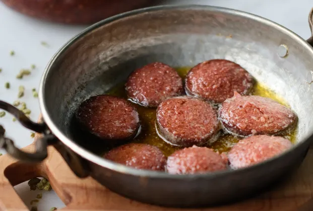Sucuk cooked in a pan