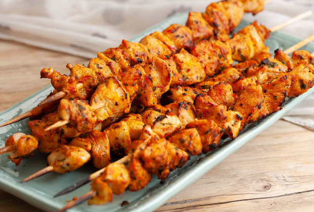 Chicken shish with rice and garnish