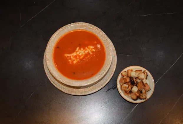 Roasted tomato soup with fresh kaşar cheese and croutons