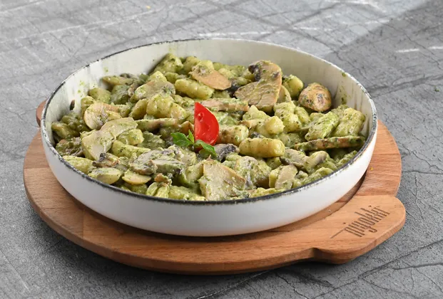Gnocchi with mixed mushrooms and pesto sauce