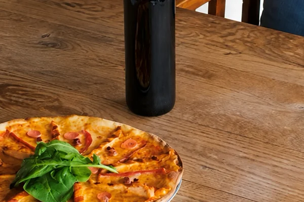 Your choice of 1 pizza & 1 bottle of Suvla Behramlı wine