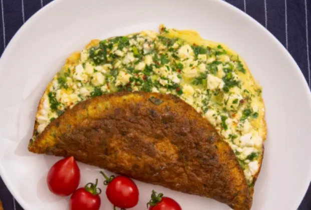 Herb and white cheese omelette