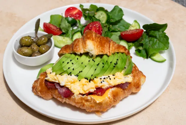 Avocado and smoked beef croissant