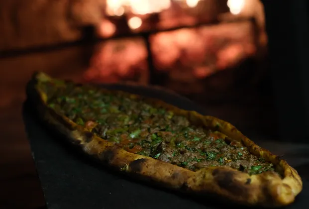 Turkish pide with diced meat