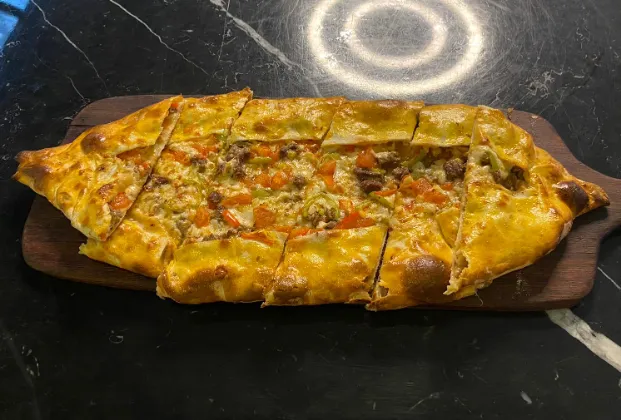 Pide with diced meat and cheese