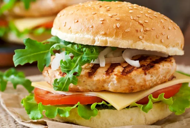 Chicken burger with fried potatoes