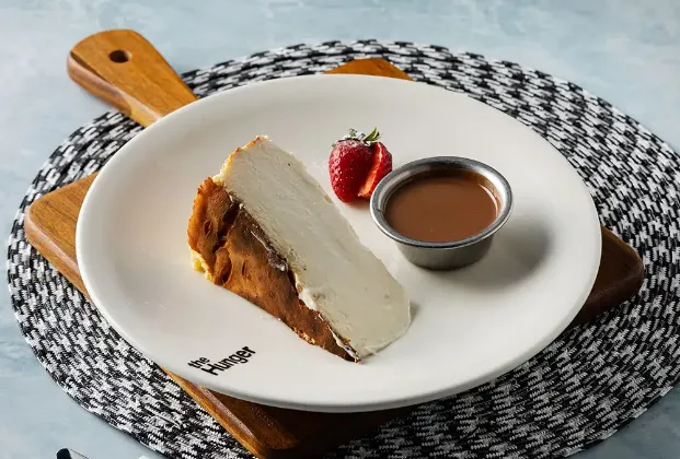 San Sebastián Cheesecake with Milk Chocolate Sauce