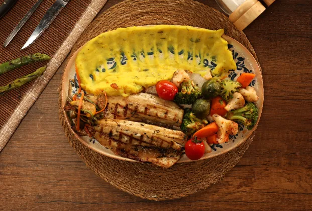 Grilled sea bass with sour caper sauce