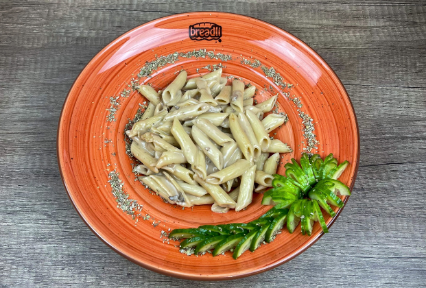 Pasta with mushroom sauce and kaşar cheese