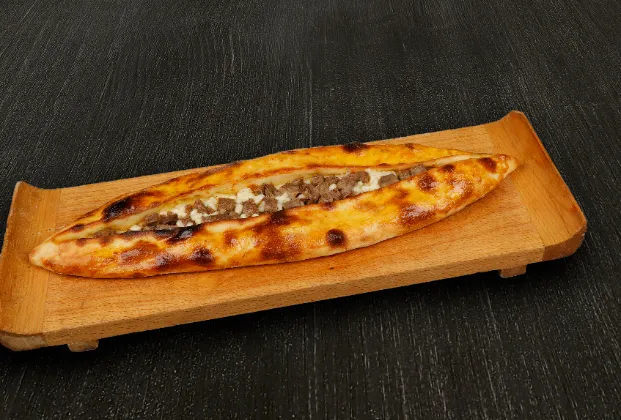 Pide with kavurma and kaşar cheese