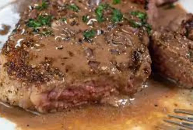 Meat with brandy sauce