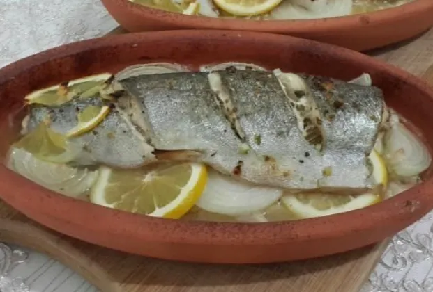 Fish baked in a clay dish