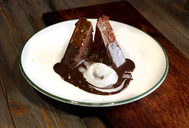 Brownie with chocolate sauce and ice cream