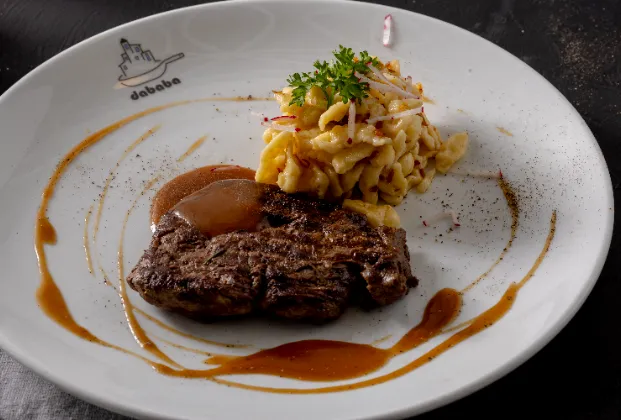 Hunter-style beef tenderloin with demi-glace sauce and Spätzle