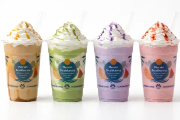 Strawberry, banana, chocolate, vanilla and caramel milkshake