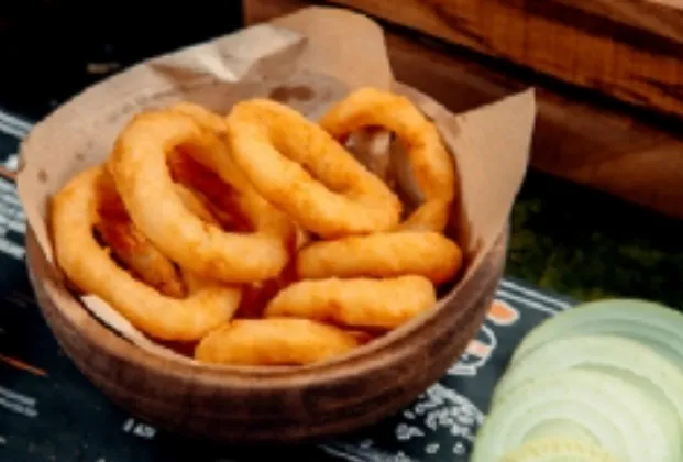 Crispy Onion Rings, French Fries and Dip Sauce