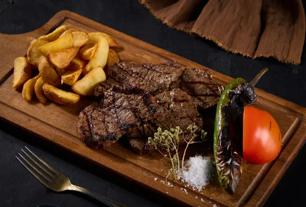 Lamb lokum with eggplant beğendi and sautéed vegetables