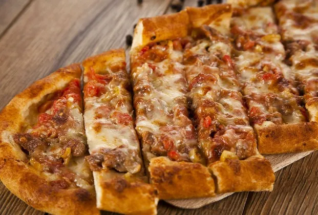 Semazen pide with diced meat and kaşar cheese