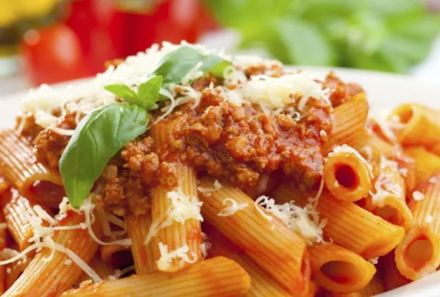 With Bolognese sauce