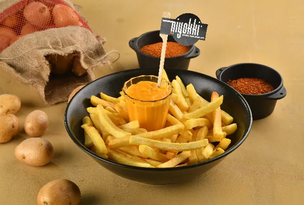 Cheddar sauce fries