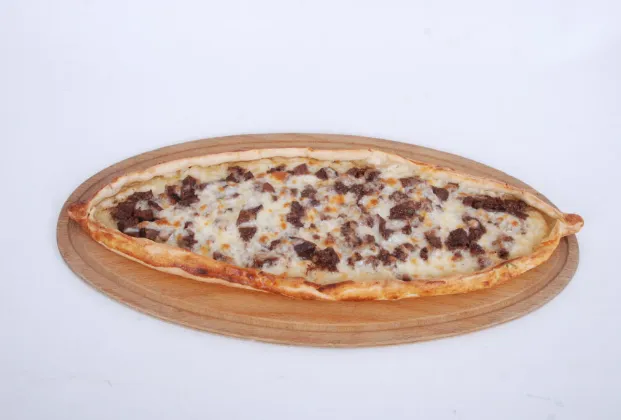 Pide with kavurma and kaşar cheese