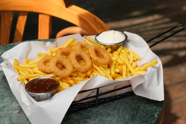 Crispy onion rings and French fries