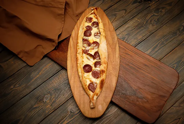 Pide with sucuk and kaşar cheese
