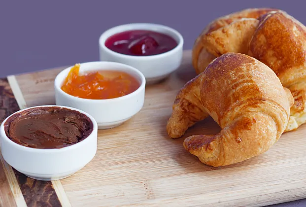 Crispy croissant platter with marmalade
