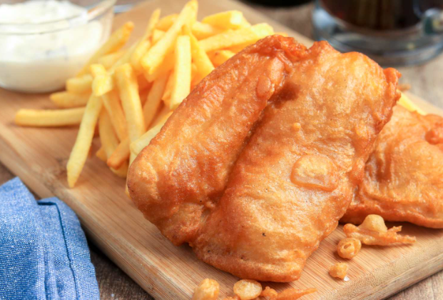 Fish and chips with fried potatoes