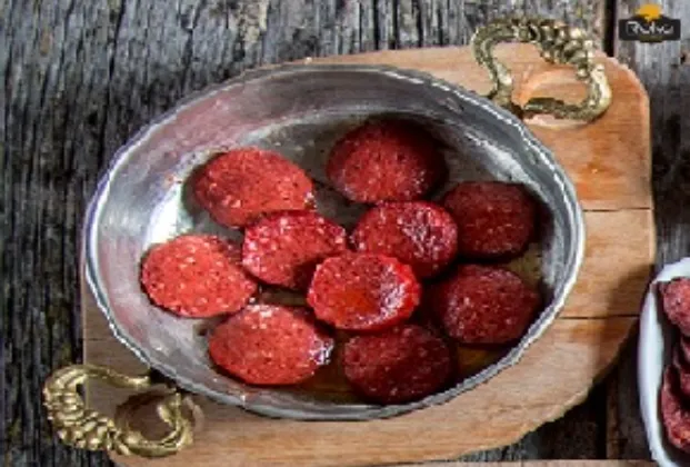 Sucuk cooked in a pan
