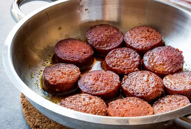 Sucuk cooked in a pan