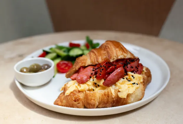Egg and sausage croissant